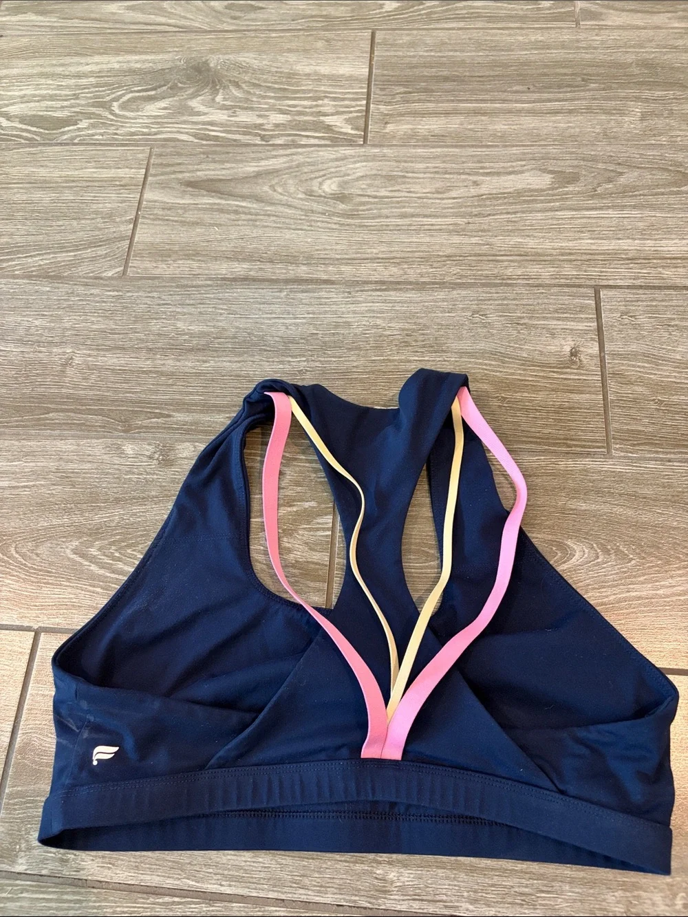 Fabletics Boost Medium Impact Navy Sports Bra with Pink and Yellow Straps